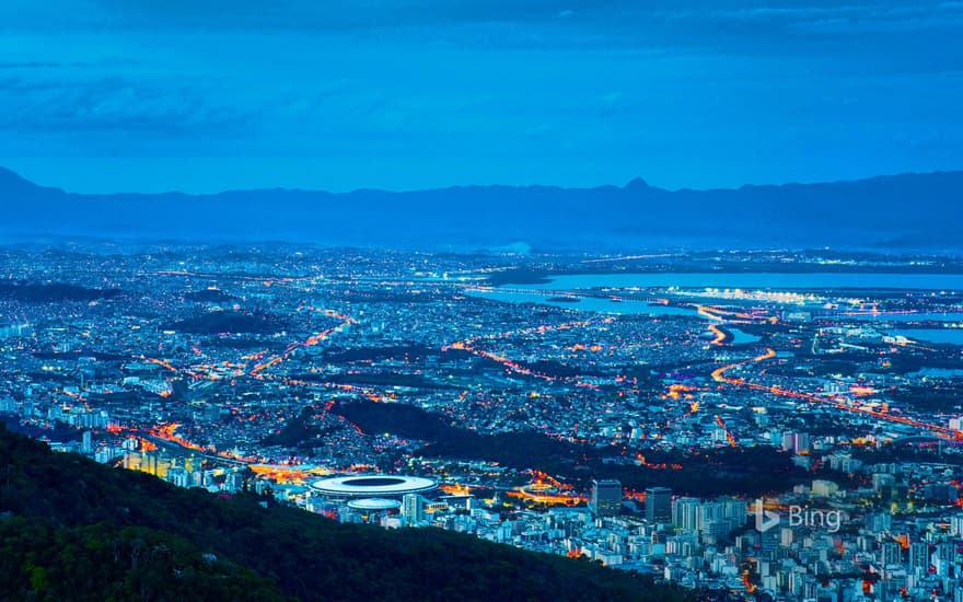 Rio de Janeiro including Maracanã Stadium illuminated at night, Brazil