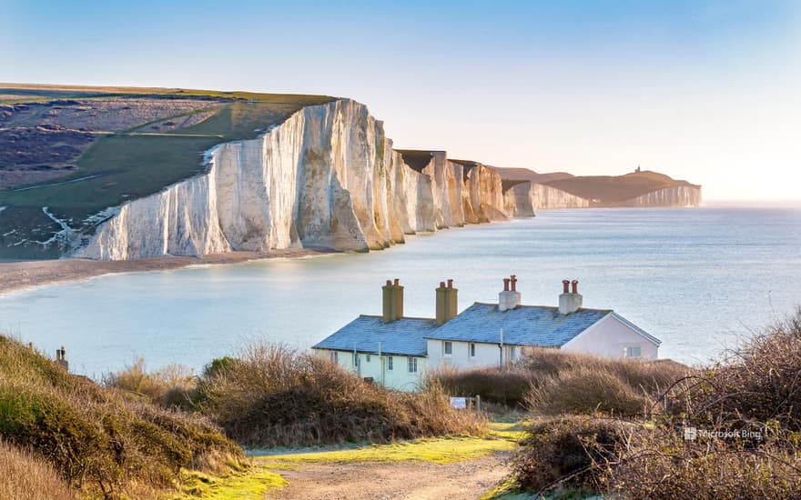 Coastguard cottages and Seven Sisters cliffs outside Eastbourne, East Sussex